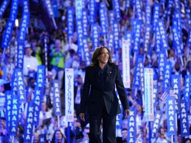 democratic presidential nominee and u s vice president kamala harris takes the stage on day 4 of the democratic national convention dnc at the united center in chicago illinois us august 22 2024 photo reuters